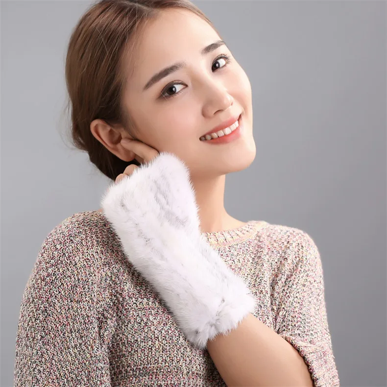beige fur mitten