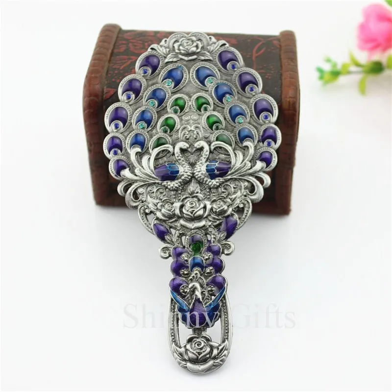 Peacock mirror with hand (20)