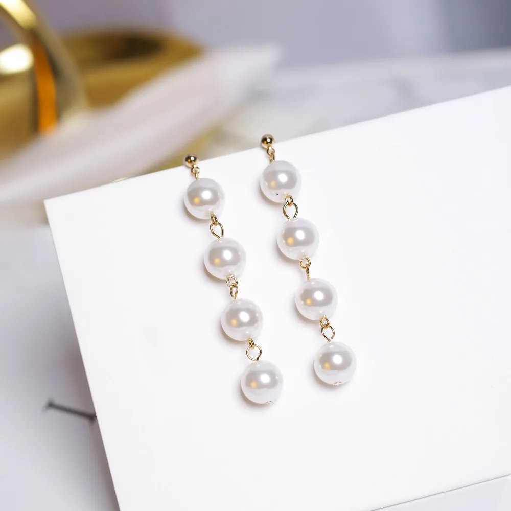 

New fashion jewelry of the popular earrings pearl long stud earring for woman