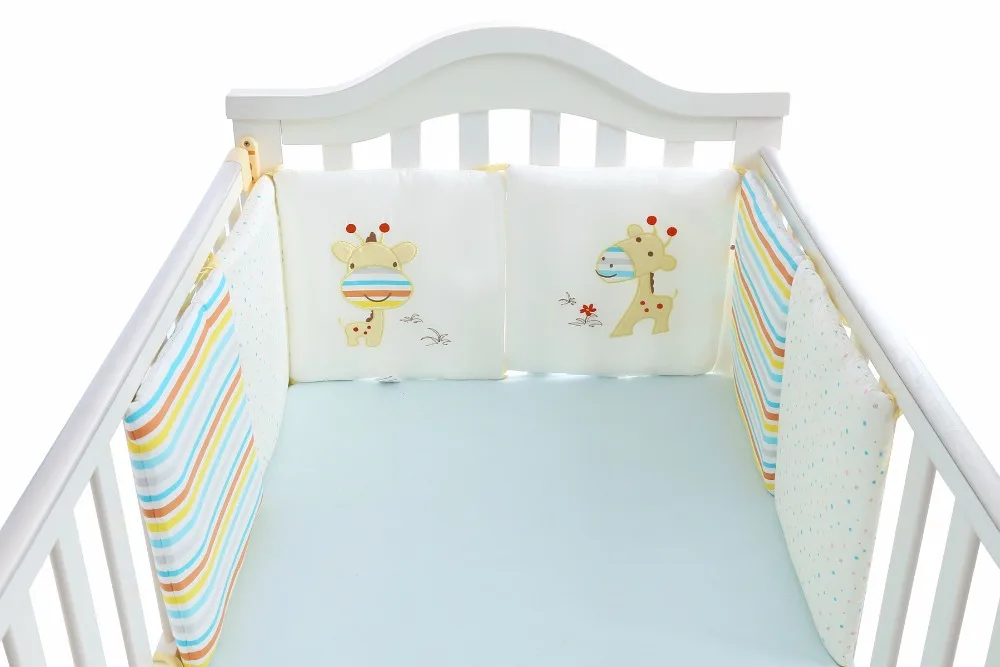 beige crib bumper