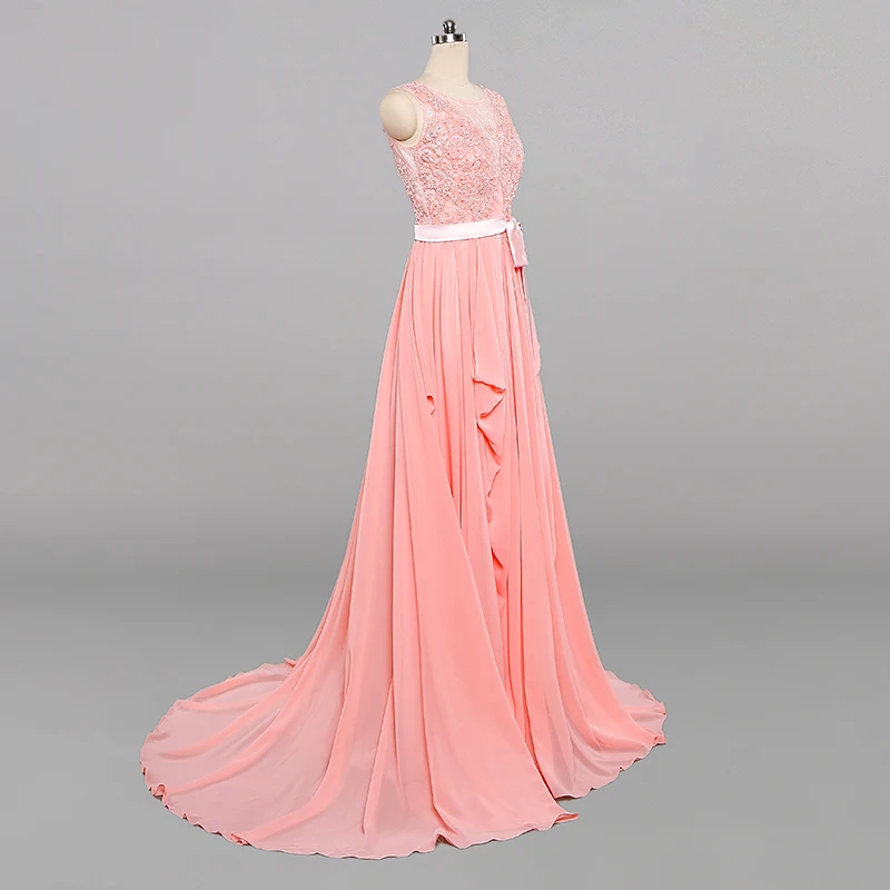 

Sheer O Neck Coral Long Evening Gowns with Removable Sash Floor Length Appliqued Chffon Formal Occasion Dress with Cascade Skirt