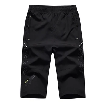 

Men's New Summer Sports Fashion All-in-one Solid Color Pocket Elastic Waist Fast Dry Casual Baggy Five-minute Shorts