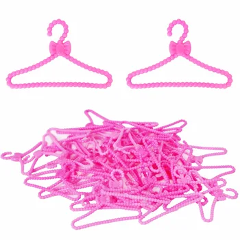 

20 Pcs / Lot Mini Doll Accessories Pink Plastic Bowknot Hangers For Barbie Doll Clothes Dress Pretend Play House Baby Toy