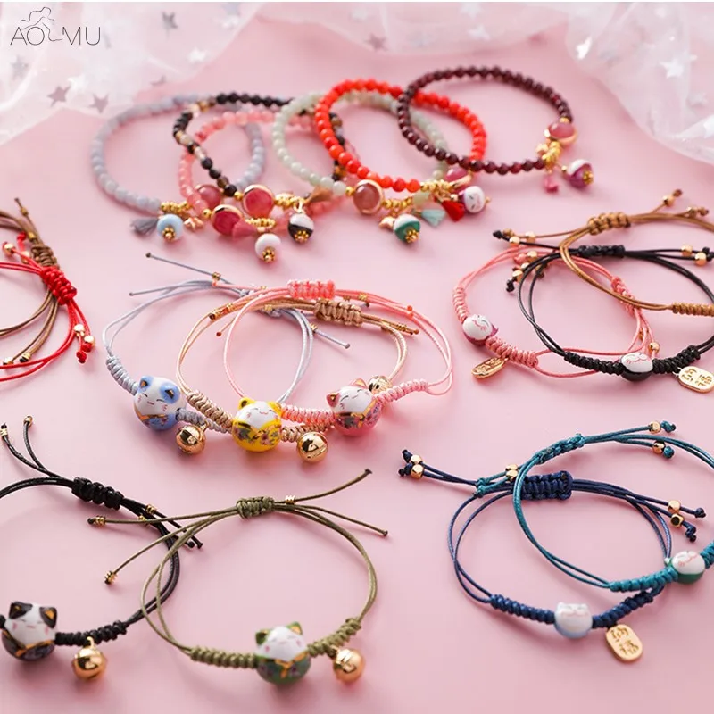 

AOMU 2019 New Simple Sweet Ceramics Color Hand Made Tassel Lucky Cat Bell Bangle Bracelet for Women Girl Gift Jewelry