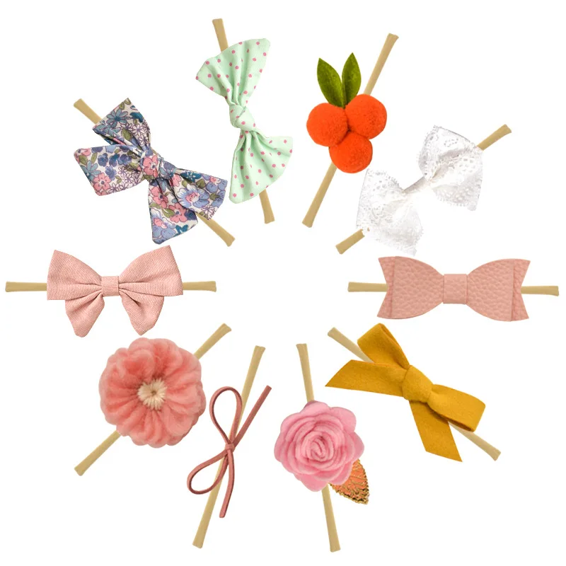 

Explosion models hot hand-assembled baby hair band super soft baby hair band no trace nylon hair band
