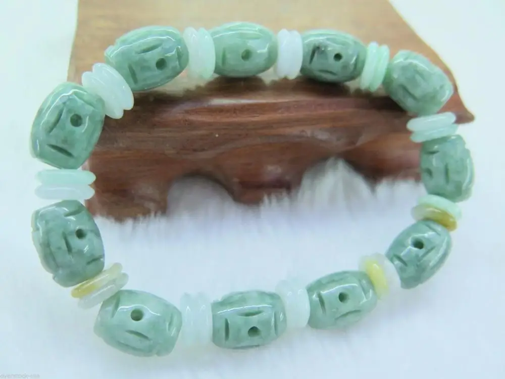 

Natural Grade A Jade (jadeite) 11mm Oil-Green Oval Carved beads Bracelet 10.16