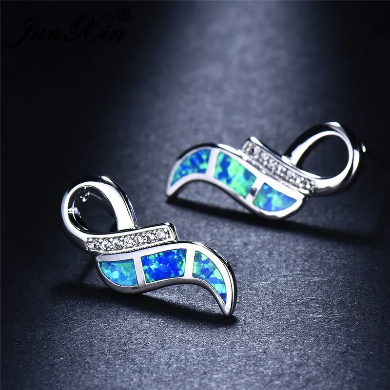 

JUNXIN Cute Angel Wings Stud Earrings For Women 925 Sterling Silver Filled Blue White Fire Opal Studded Earring Female Jewelry
