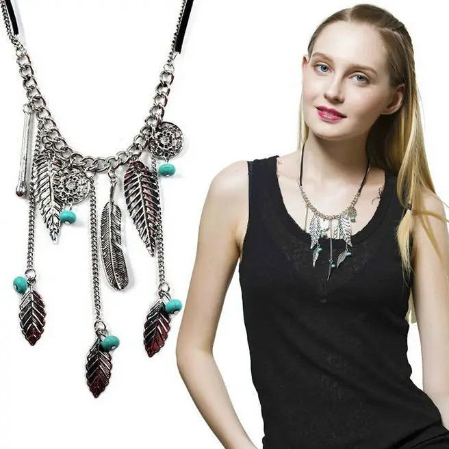 

New Best quality Free Shipping fashion jewelry vintage Bohemia necklace leaf cutout flower blue stone round tassel chain women