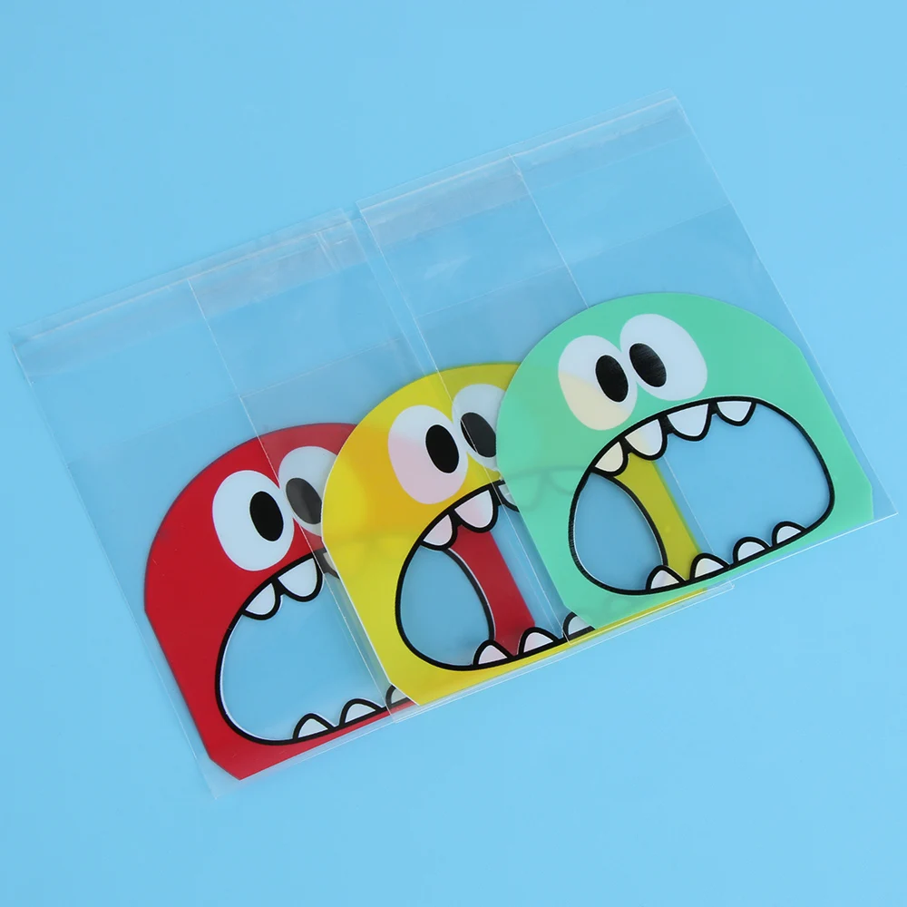 

100Pcs/Pack Cute New Self Adhesive Cartoon Cookie Pouch Candy Package Gift Bags Children Gift Christmas Wedding Party Favors