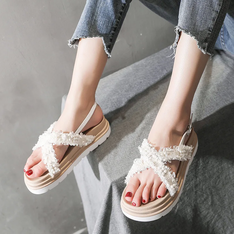 

Muffin sandals female fairy wind 2019 new summer wild thick bottom word Roman shoes tide platform shoes women fashion