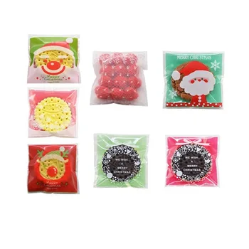 

100pcs/lot Xms Gift Bags Christmas Santa Claus Snowman Snacks Cookie Plastic Packaging Bags Party Wedding Candy Bag Kids Favor