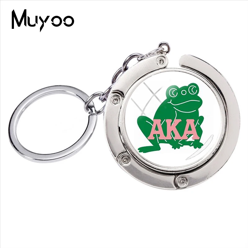 

2018 New Fashion AKA Sorority logo Glass Cabochon Bag Hanger Round Key Ring Jewelry Accessories for Women and Men