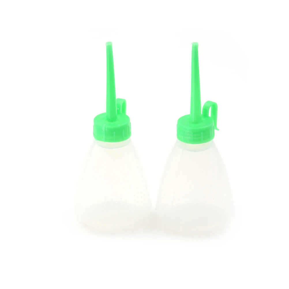

Sewing Machine Oil Bottle Empty Transparent Polyethylene Needle Dispensing Bottle for Rosin Solder Flux Paste 50ml 2pcs