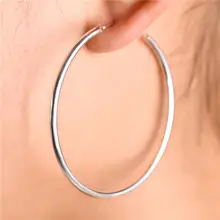 Женские серьги кольца из серебра с полированным