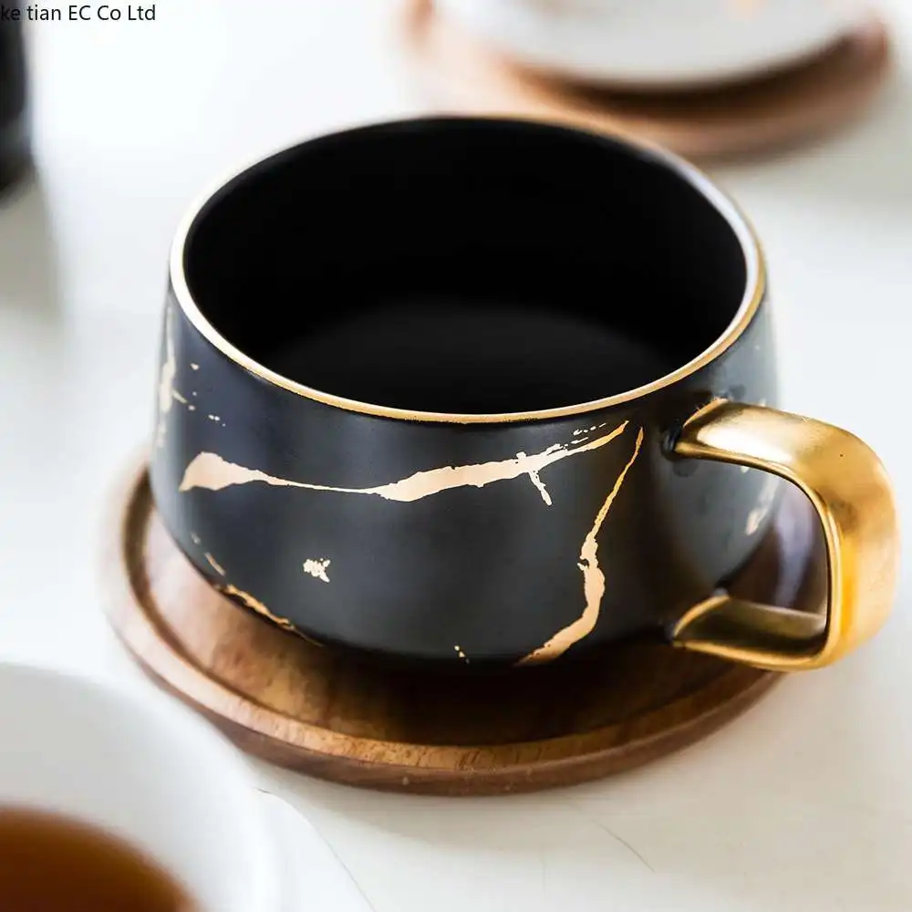 

Luxury matte ceramic marble tea coffee Cups and with wood Saucers black and white gold inlay ceramic cups