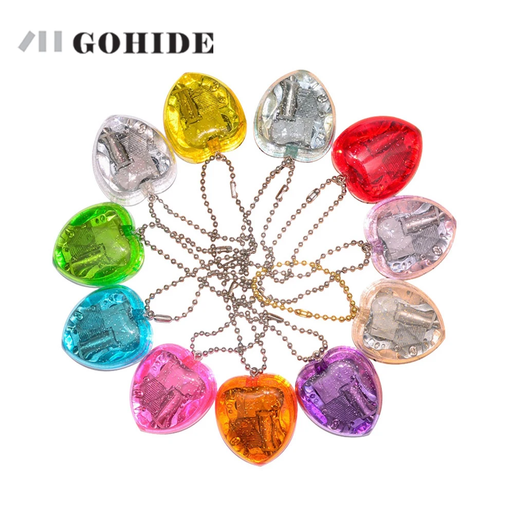 

GUHD A Brand New KeyChain Music Box Girls Gift Mini Acrylic Wind Up Heart Shape Musical Box Key Chain Kid Beautiful Pendant