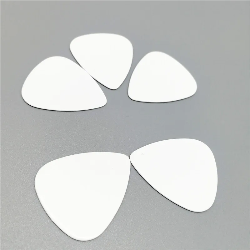 Cheapest Plastic Celluloid Guitar Picks 0.46mm Thin to 1.5mm Extra Heavy Gauge Plain White Color for Guitar Cheapest Plastic Celluloid Guitar Picks 0.46mm Thin to 1.5mm Extra Heavy Gauge Plain White Color for Guitar