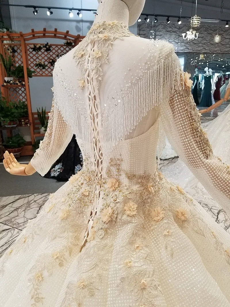 Sexy Sheer Высокая шея кисточкой кружевное бальное свадебное платье кристалл длиной