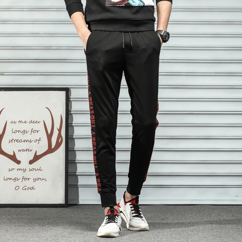 

2019 men's casual pants spring and summer and autumn youth Korean version of the trend of men's pants beam feet pants