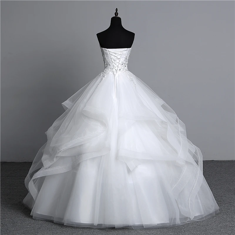 white pearl wedding dress