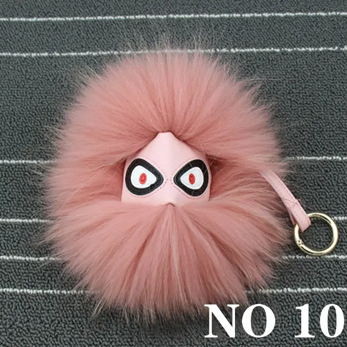 

Cute Monster Fluffy Genuine Raccoon Fur Pompom Keychain Fur Ball Pom Pom Key Chain For The Keys Women Bag Accessories Bag Charm