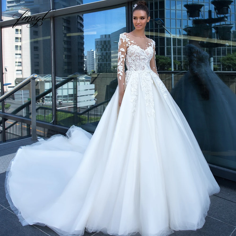 

2019 New Beach Wedding Dresses White ivory Sexy Backless Lace Appliques A Line Wedding Tail Bridal Gowns