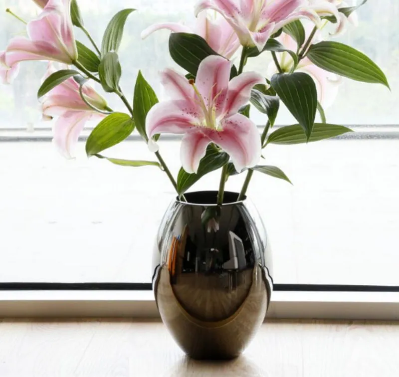 

metal round vase Simple vase stainless steel black vase can save water