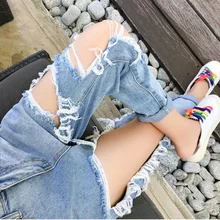 5xl плюс большие размеры Джинсы трусики женщины Весна-осень Стиль Осень feminina отверстия свободные тонкие рваные джинсы женские Y1518