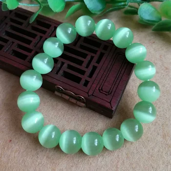 

Tender green cat's eye stone bracelet crystal hand string transfer beads bracelet male and female couple gift gift