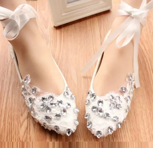 white flats with ribbon