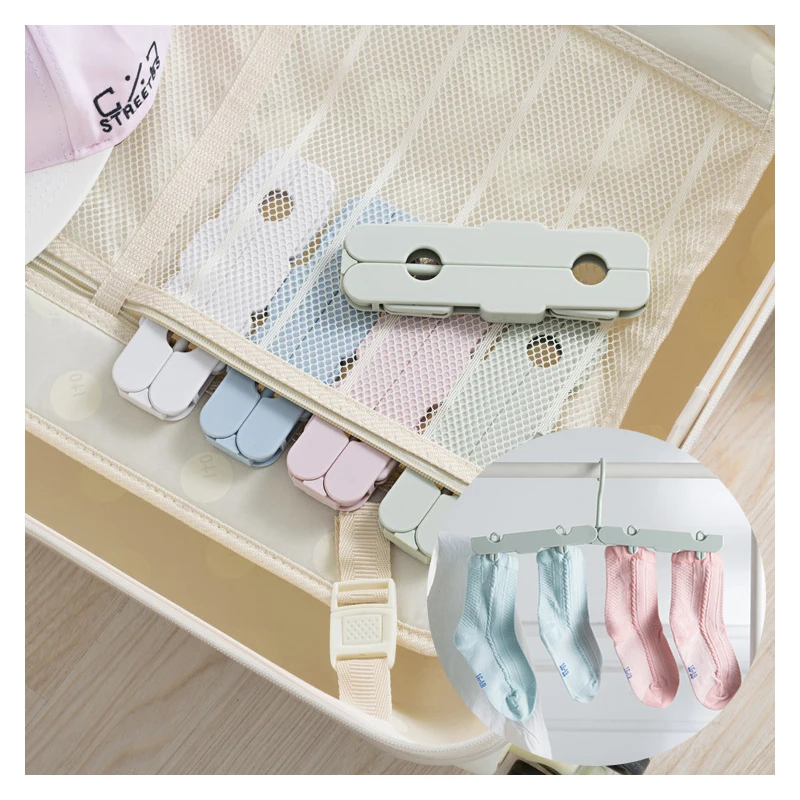 

1PCS Portable Folding Hanger Space Saving Multifunction Magic Stretch Clothes Hangers Travel Artifact Suit Magic Clothes Hanger