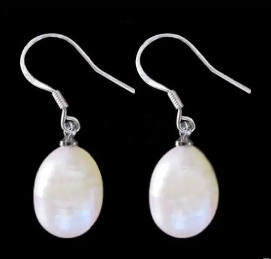 

Free Shipping >>>> Trendy 6X8mm oval white freshwater cultured pearls 925sterling silver earrings