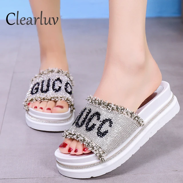 

Slippers female summer new flat bottom edge beach slippers thick bottom fashion rhinestones wild non-slip sandals C1334