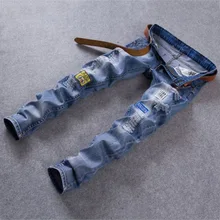 The new jeans male teenagers Foot trousers cultivate one’s morality spring Hole pants beggar pants