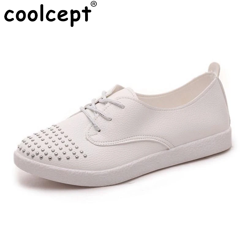 

Coolcept Fashion Women's Flats Shoes Women Cross Strap Rivet Round Toe Flats Shoes Women Simple Daily Women Shoes Size 35-39