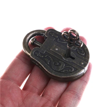 

Vintage Metal Cast God Lock Key Puzzle Toy IQ EQ Mind Brain Teaser Kid Gift -17 YJS Dropship