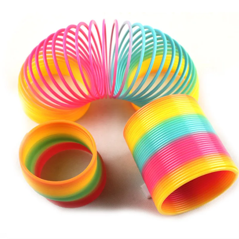 

Big Rainbow Spring Magic Tricks Spring Ring Funny Gadgets Stress-Relieve Plastic Magic Slinky Toys for Children Kids free ship