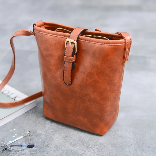 

New Bucket Bag Korea Solid Color PU Shoulder Messenger Bag Retro Women's Bag Brand Designer 2018 Fashion Trend Single Polyester