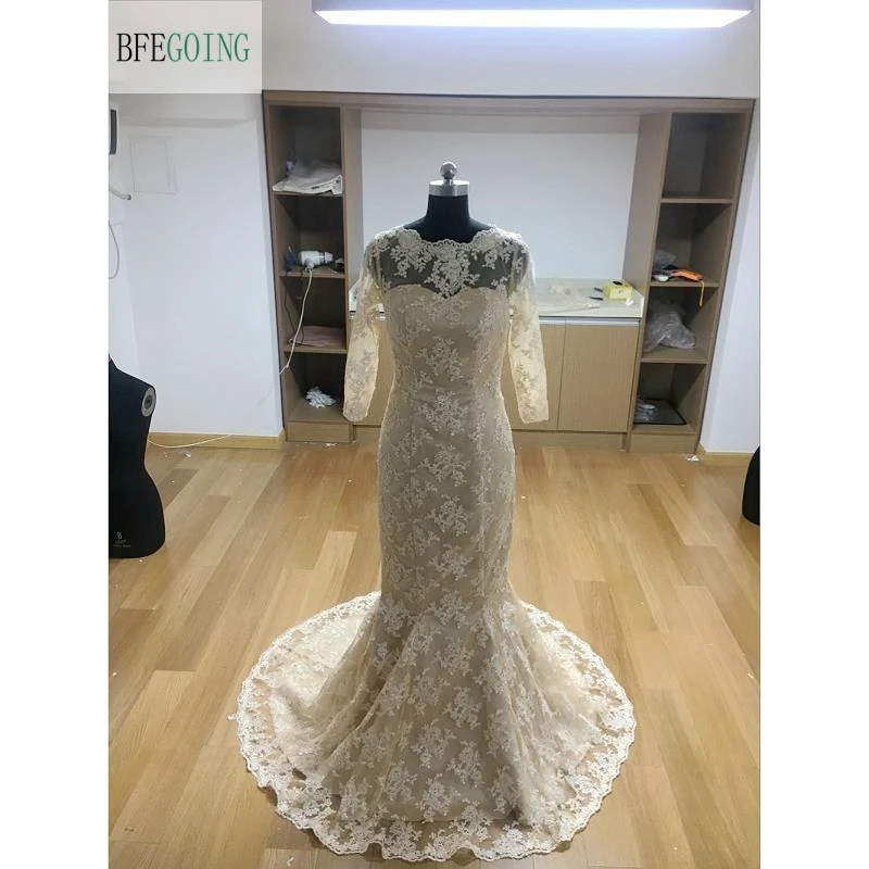 champagne trumpet wedding dress