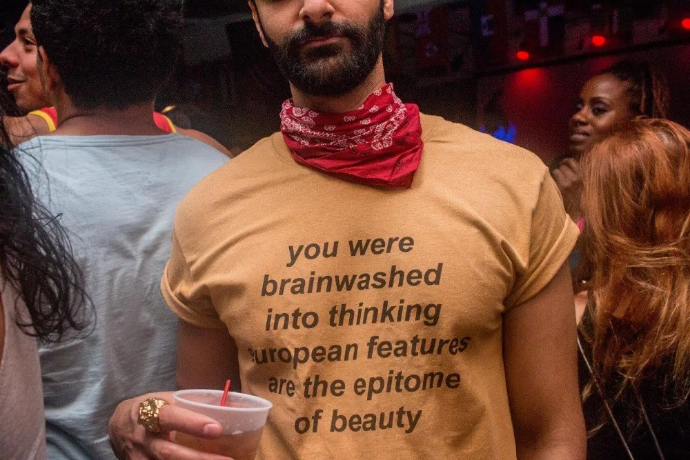 

You Were Brainwashed Into Thinking European Features Are The Epitome of Beauty Funny Graphic T-Shirt Yellow Clothes Tee Girl Top