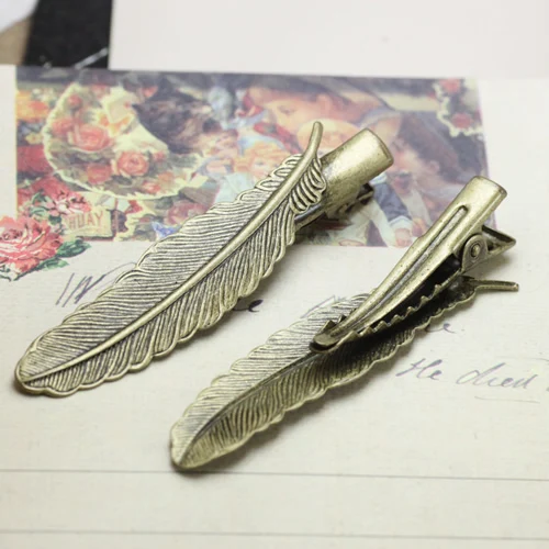 

feather:12*52mm clip length:35mm /bronze hair clip 100pcs