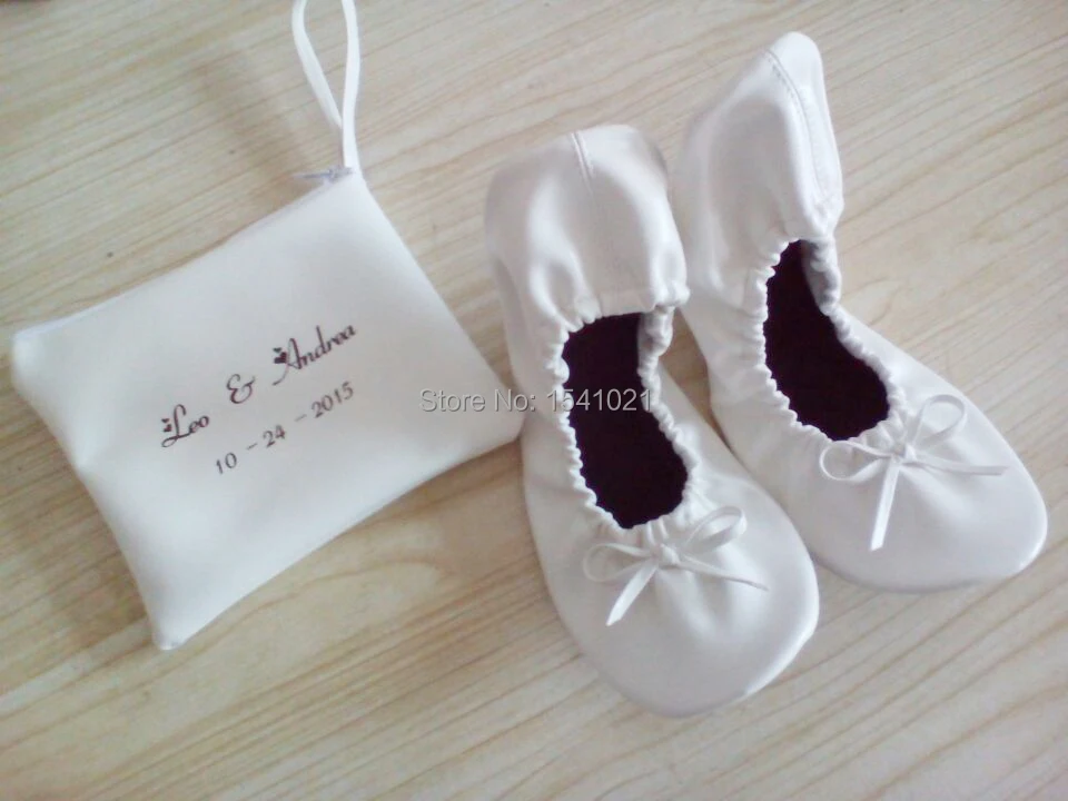 white shoes with black logo.jpg