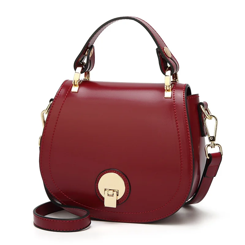

The new type of oil-wax piggy bag 2019 recreational one-shoulder inclined chaotic round lady's bag handbag.