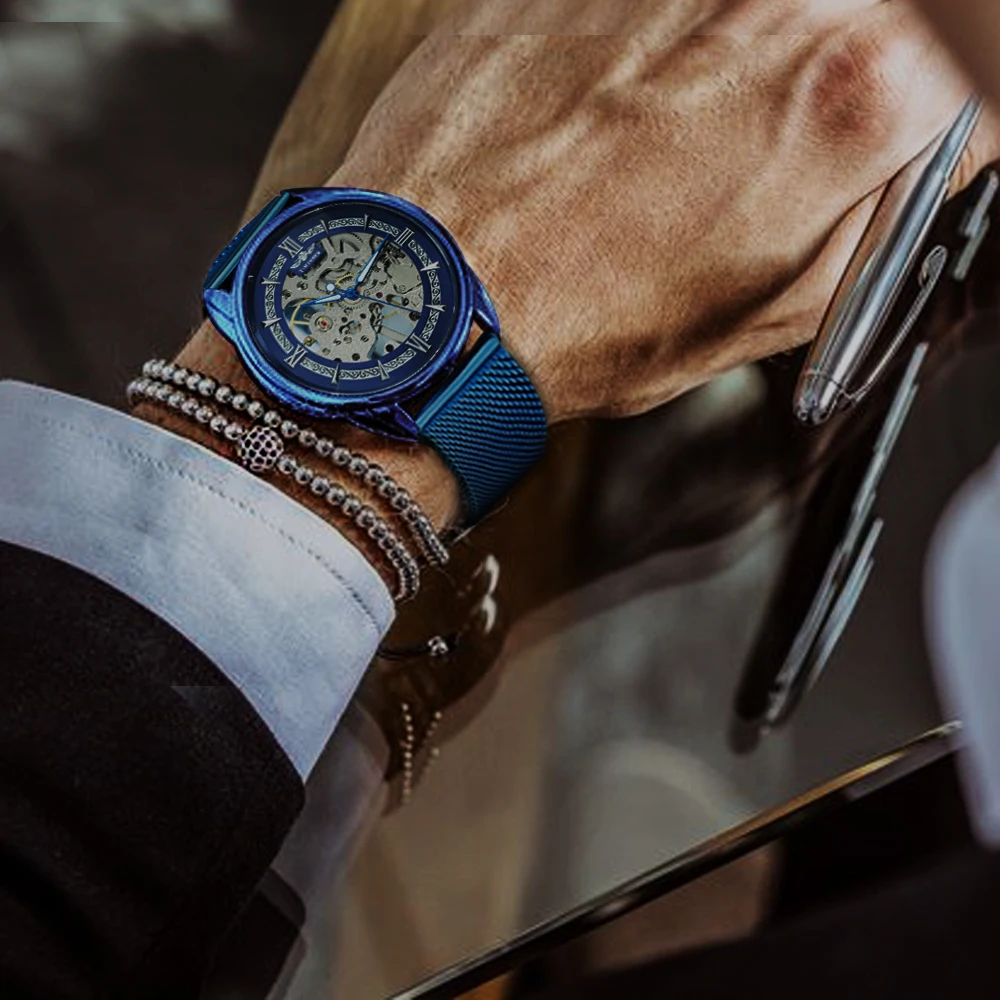 الفائز جديد أزياء عارضة الرجال الميكانيكية ووتش الأزرق شبكة حزام رقيقة جدا الهيكل العظمي الهاتفي للرجال ساعات الأعلى العلامة التجارية الفا...