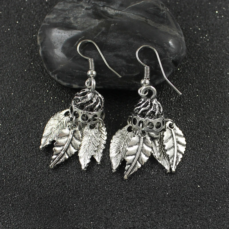 

Creative Personality Metal Bell-shaped Earrings Artistic conception Metal Bell-shaped Gold-plated Silver Leaf Jewelry