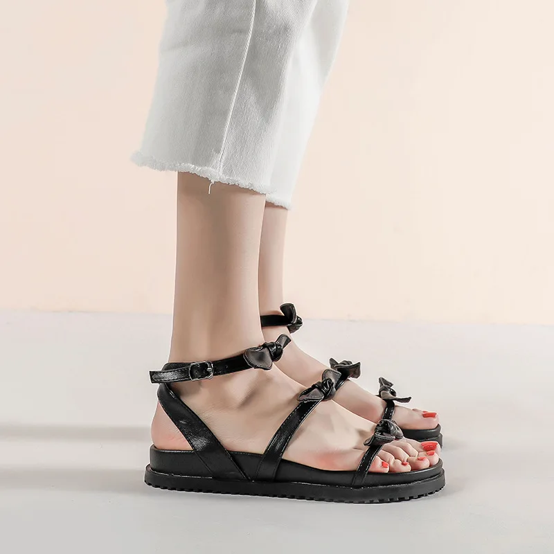 

2019 summer new comfortable simple solid color sandals women comfortable wild bow decorative casual sandals