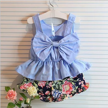 

Speed sell pass summer girl suit back bow vest skirt + 2 times children's wear a floral shorts