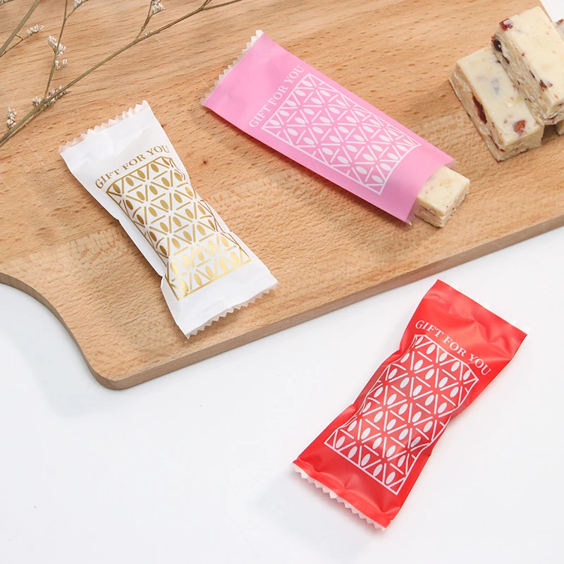 LBSISI Life 200Pcs Nougat Sugar Plastic Bags Peanut Candy Wrappers Handmade Candy Wrapping Bakery Decoration Packaging 4*9.5cm