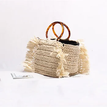 

2019 New Woven Bag Female Straw Tassel Amber Round Portable Korean Version of The Wild Holiday Beach Slung Shoulder Bag