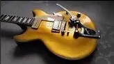 

Customized body shape and headstock shape 6 string electric guitar,gold top and black back,chrome parts! free shipping!